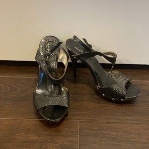 Snakeskin reptile black strappy heels